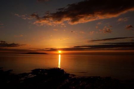 A beautiful sunset seen here over Galway Bay in Irelandの写真素材