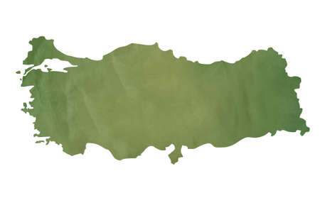 Old green map of Turkey in textured green paper, isolated on white background.の写真素材