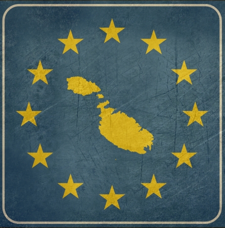 Grunge Malta map on blue and starry European button isolated on white background with copy space.
の写真素材