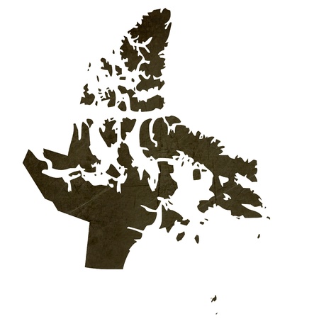 Dark silhouetted and textured map of Nanavut province of Canada isolated on white background.の写真素材