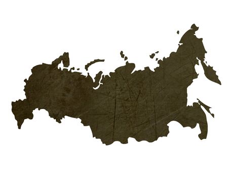 Dark silhouetted and textured map of Russian Federation isolated on white background.の写真素材