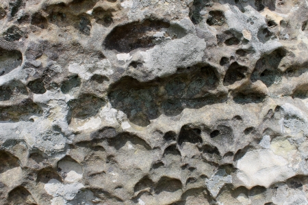 Abstract background of textured rock or stone.