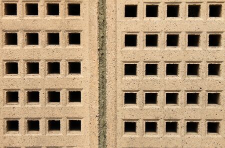 Abstract textured background of building air bricks.