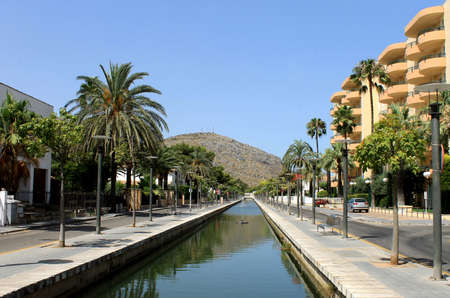 Canal in Alcudia town on island of Majorca, Spain.の写真素材