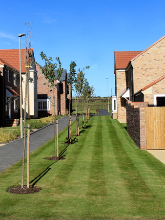 EASTFIELD, SCARBOROUGH, NORTH YORKSHIRE, ENGLAND - 10th of October 2016: New build housing estate pictureed in Scarborough on 10th October 2016. Exterior of new houses.のeditorial素材