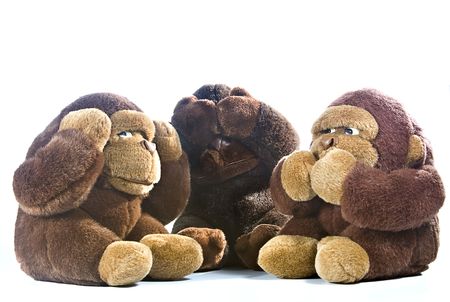 Three plush gorillas represnting the proverb of the wise monkeysの写真素材