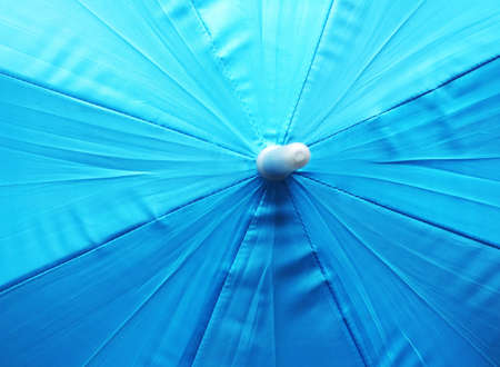 The blue full closeup umbrellaの写真素材