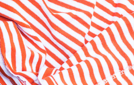 Red striped texture on the fabricの写真素材