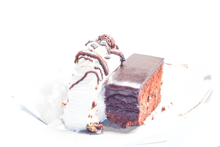 Chocolate cake and vanilla cream in the box