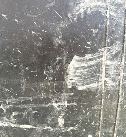 stain and dirty on the black wallの写真素材