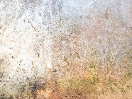 Wet and moist on the grunge cement wall texture backgroundの写真素材