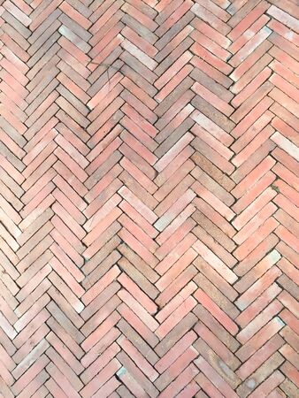 Grunge orange brick floor texture backgroundの写真素材