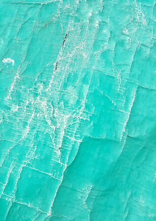 Grunge and old green canvas revealed a torn decay.