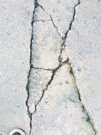 crack cement concrete floor backgroundの写真素材