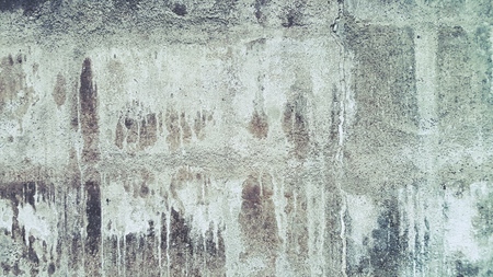 Crack and grunge dirty stain on the old cement backgroundの写真素材