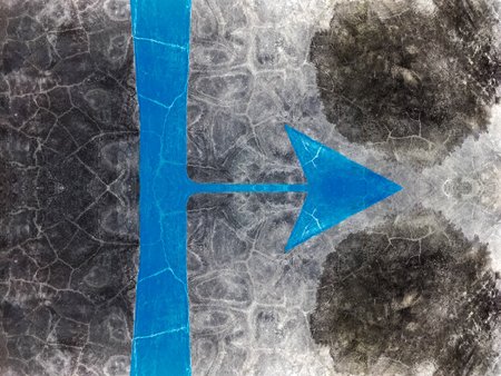 blue arrow on dirty concrete texture backgroundの写真素材