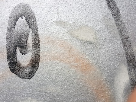 color stain on the concrete wall backgroundの写真素材