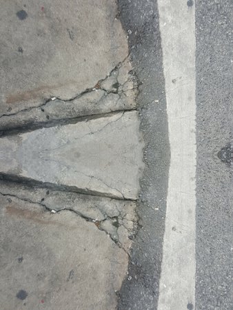 grunge crack concrete road texture backgroundの写真素材