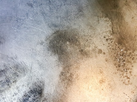 grunge fire burn stain on stainless texture background