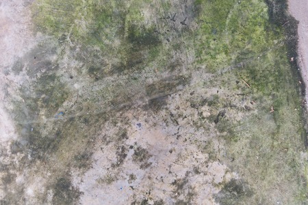 grunge moist dirty stain concrete wall texture backgroundの写真素材