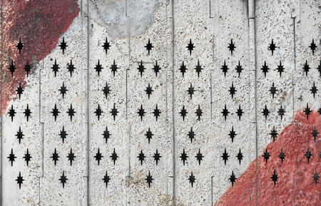 rough red and white steel door textureの写真素材