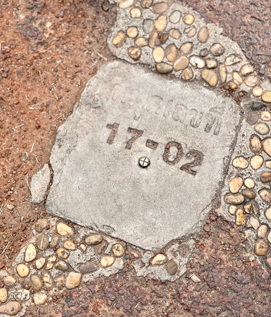 memorial tablet with a small diamond on it on the ground.の写真素材