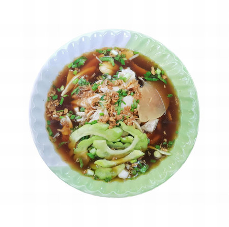 a photography of a bowl of soup with meat and vegetables, there is a bowl of soup with meat and...