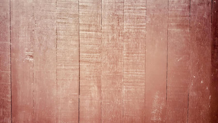 a photography of a red wooden wall with a white fire hydrant, there is a red wooden wall with a red fire hydrant.の写真素材