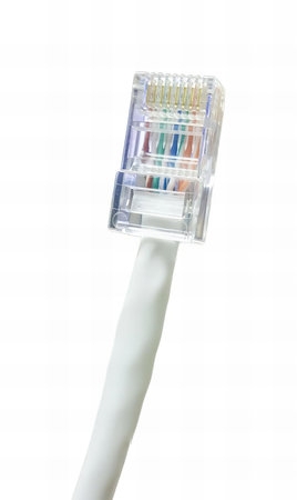 a photography of a toothbrush with a white handle and a colorful tooth brush, there is a toothbrush...