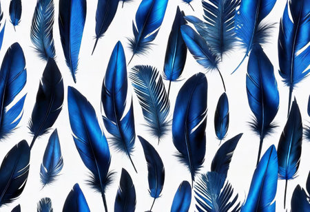 a close up of a bunch of blue feathers on a white surface, ring - binder of blue feathers against a white background.の素材
