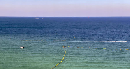 a photography of a boat in the ocean with a yellow rope, speedboats and boats in the ocean with a...