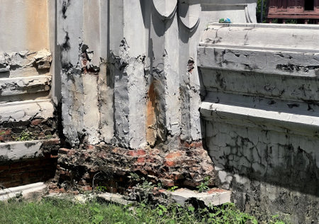 a broken wall with a broken base..