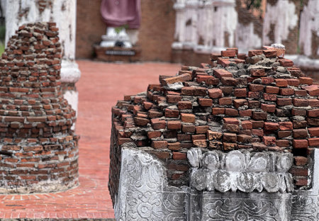a stack of bricks in the courtyard of the temple..