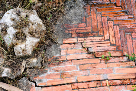 a broken brick wall with a broken brick.