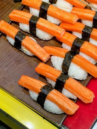 a photography of sushi on a stick.の写真素材