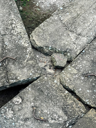 a broken stone wall in the park.の写真素材