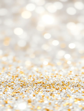 an image of a close up of a gold and silver glitter background, there is a gold and silver glitter background with a white backgroundの素材
