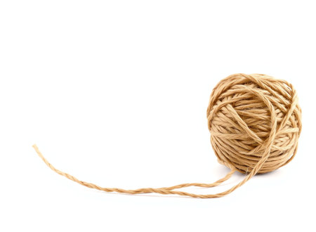 an image of a ball of yarn on a white background, a close up of a ball of yarn on a white surfaceの素材