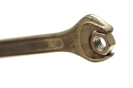 Wrench with screw nut isolated on white backgroundの写真素材