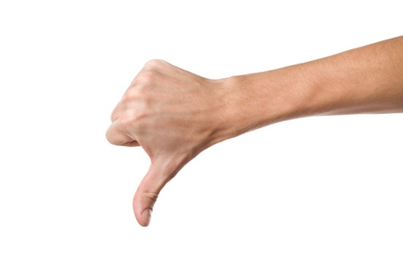 Disapproval - thumbs down hand sign isolated on white backgroundの写真素材
