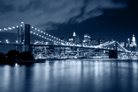Brooklyn Bridge at night in blue cold tintの写真素材