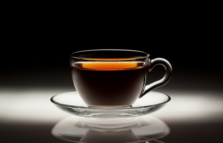Tea cup on abstract dark backgroundの写真素材