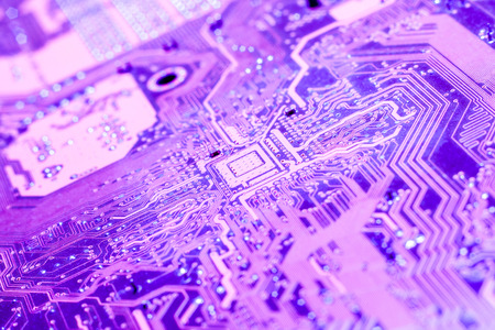 A printed circuit board (PCB) connects electronic or electrical components using conductive tracks, from copper. Transistors, diodes, IC chips, resistors, connectors and capacitors are soldered on.の写真素材