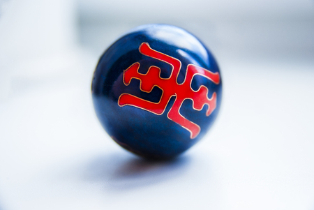 China Black ball with Red Symbol. Red Pattern on the Ball.の写真素材