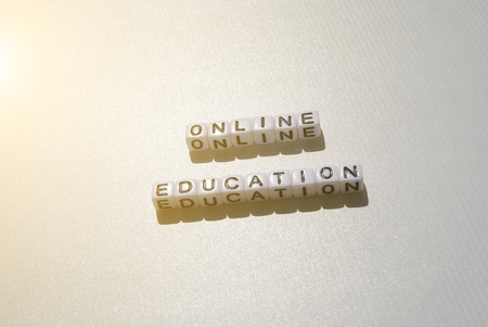 Word ONLINE EDUCATION  in cubes on  white backgroundの写真素材