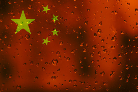 Flag of China on a water drops background. Chinese Flags waterdrop textureの写真素材
