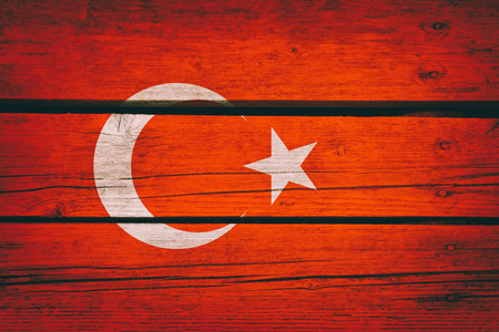 Turkey National Flag on a wooden bavkground. Turkish Flags wood texture.の写真素材