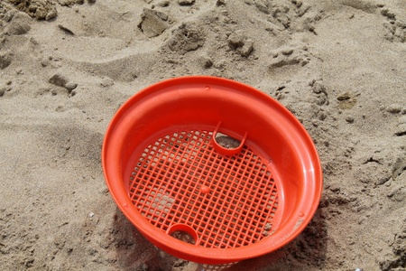 beach toy on the sandの写真素材