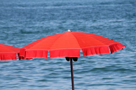 beach umbrella at lakeの写真素材
