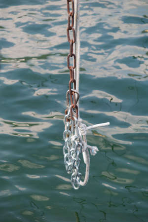 old rusty chain on lake